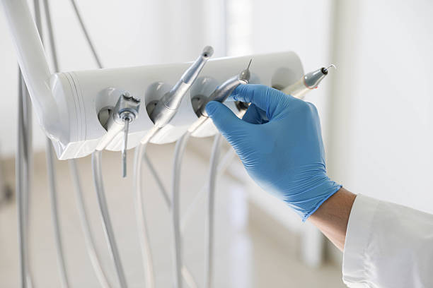 Professional Tooth Extraction technician working in Cross Roads, TX